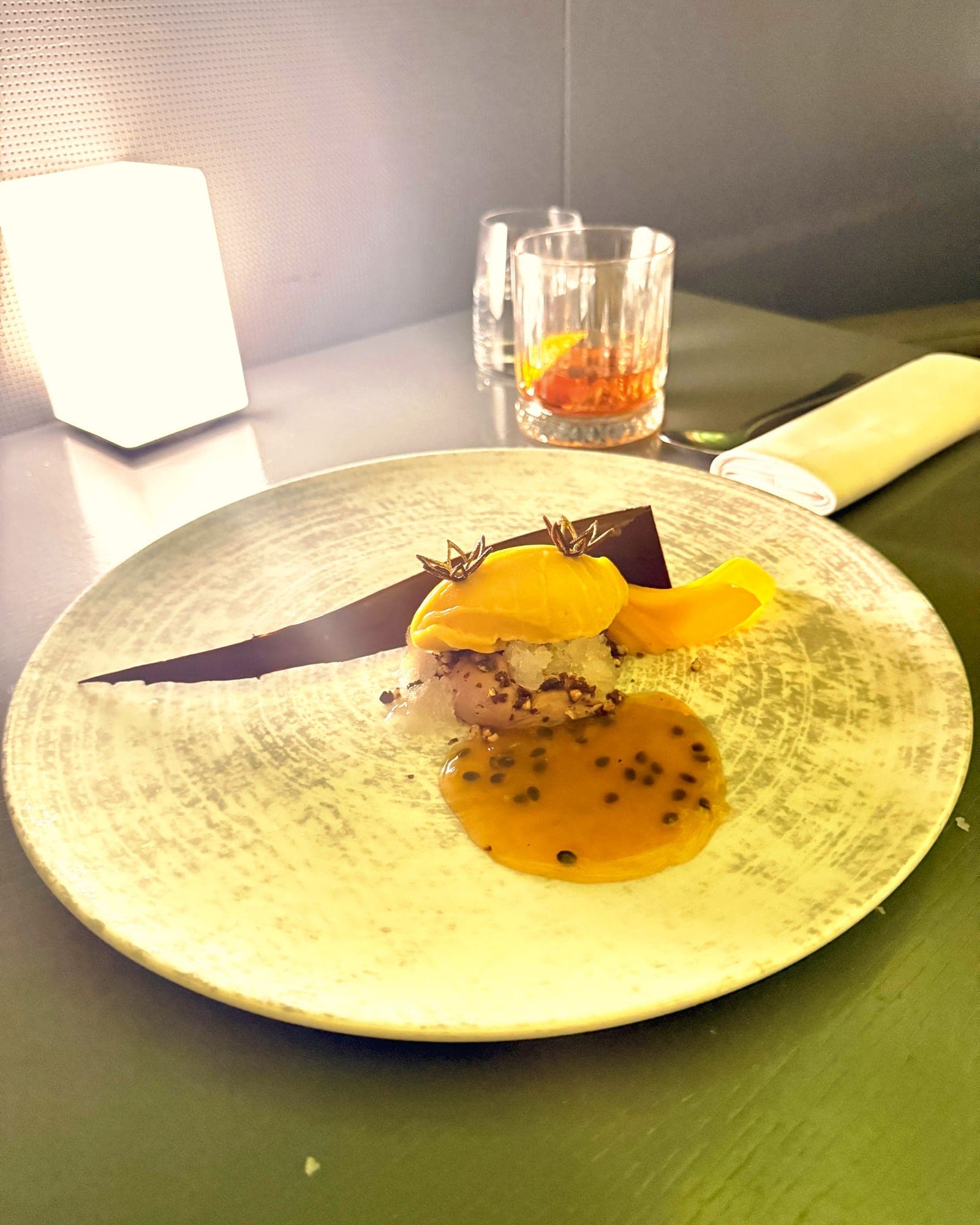 Dessert at Das Loft, plated with passion fruit