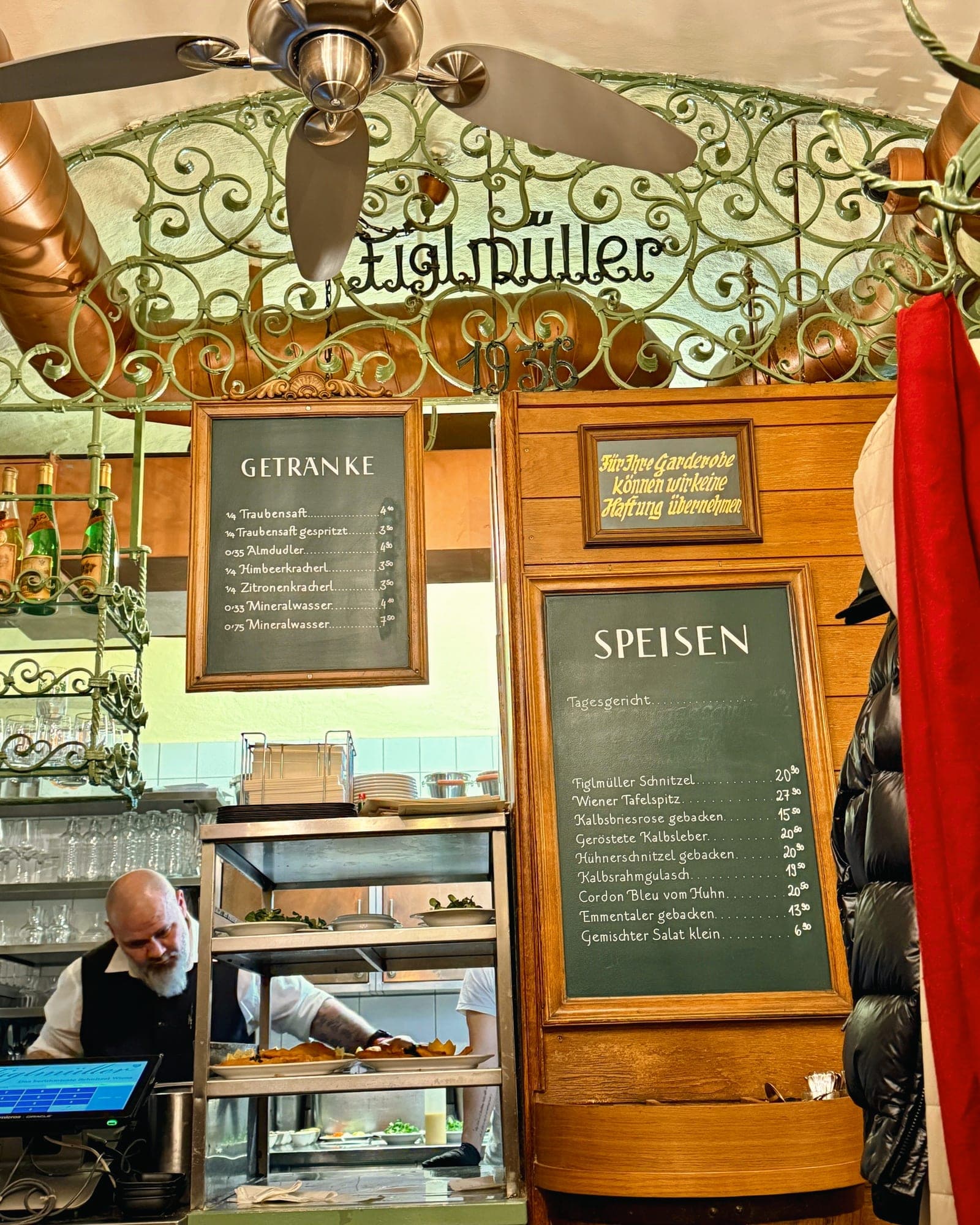 The Figlmüller entrance with its wrought-iron sign and chalk menu boards