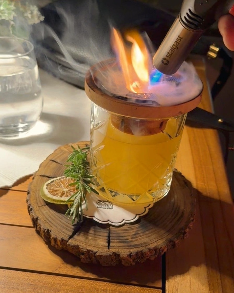 A smoking cocktail at Nautika, lit at the table