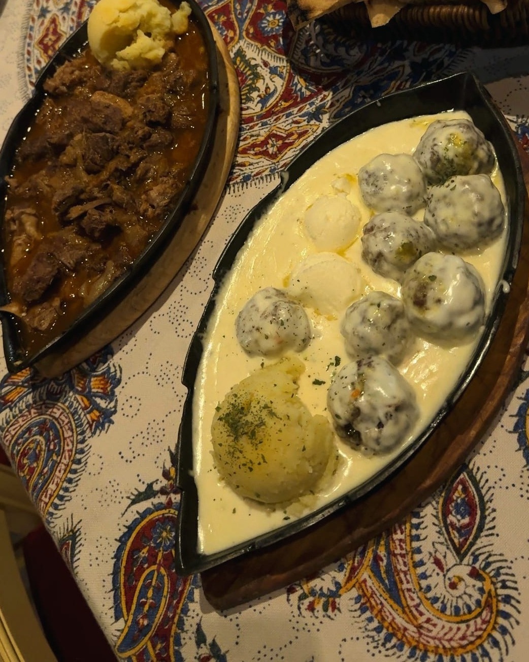 Both dishes at Nanina Kuhinja: the veal ćevap and the meatballs in kajmak, with bread